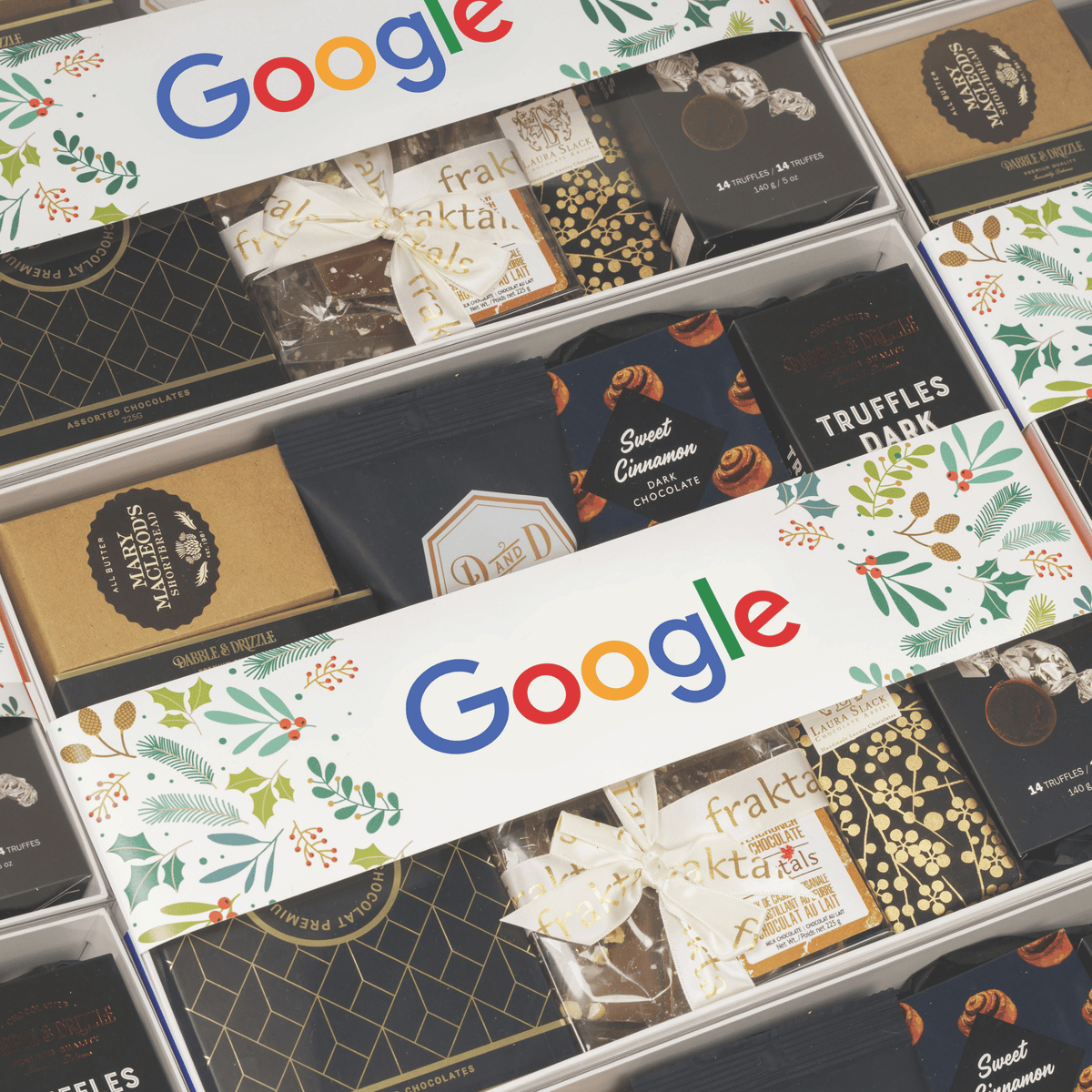 orporate holiday gift boxes filled with gourmet chocolates and treats, wrapped with personalized festive Google logo bands.