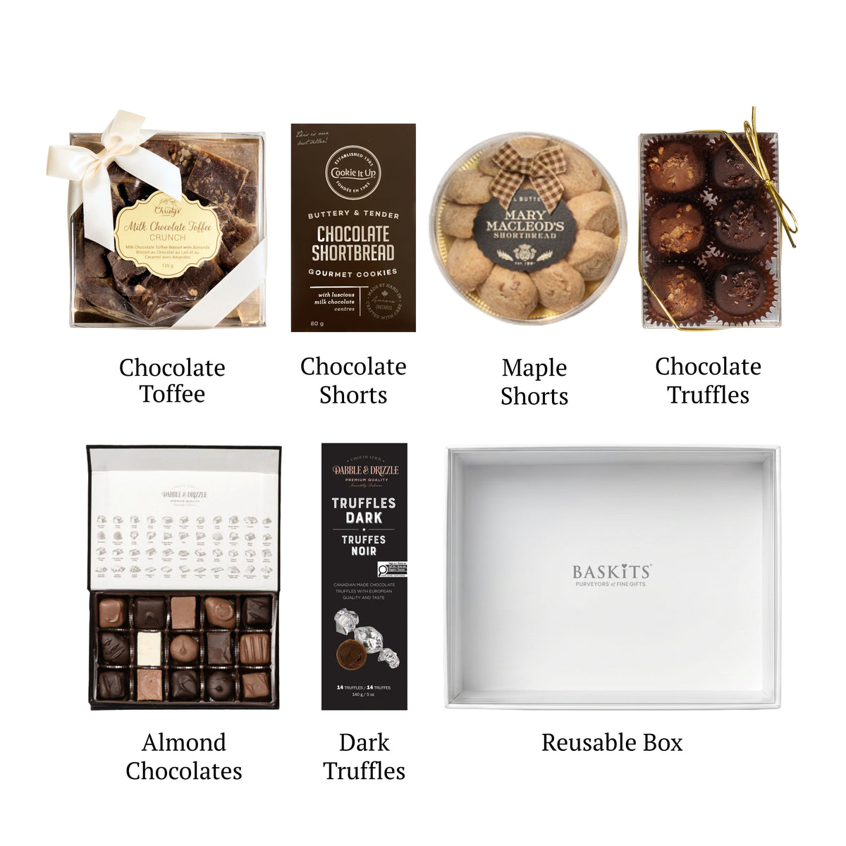 Flat lay of Art of Chocolate, showing all 6 items included in the box, including the Chocolate Shortbread Cookies,Maple Crunch Shorts and White Box with Clear Top.