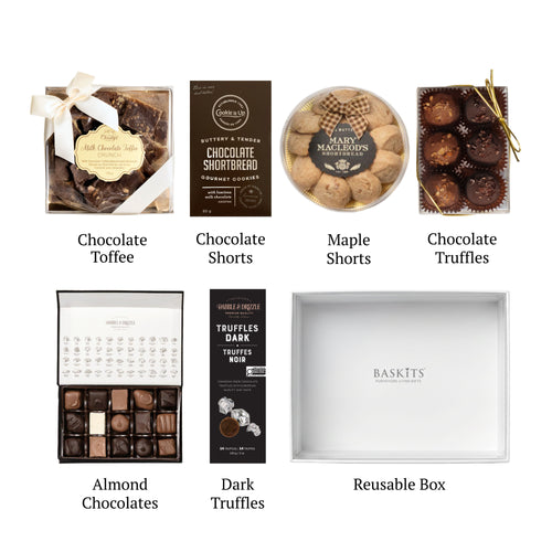 Flat lay of Art of Chocolate, showing all 6 items included in the box, including the Chocolate Shortbread Cookies,Maple Crunch Shorts and White Box with Clear Top.