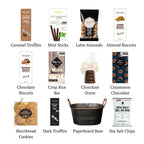 Flat lay of Champlain L , showing all 11 items included in the basket, including the Dark Truffles, Carmel Truffles and Paperboard Base.