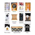 Flat lay of Kosher XL, showing all 10 items included in the basket, including the Salted Caramel Thin & Crisp, Chocolate Chip Shortbread  and base.