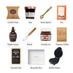 Flat lay of Let's Do Brunch, showing all 10 items included in the box, including the Bonne Maman Strawberry Jam, Nutella Hazelnut Spread and base.