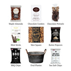 Flat lay of Champlain S, showing all 8 items included in the basket, including the Chocolate Covered Pretzel & Chocolate Crunch Cookies and Oval Keepsake Planter.
