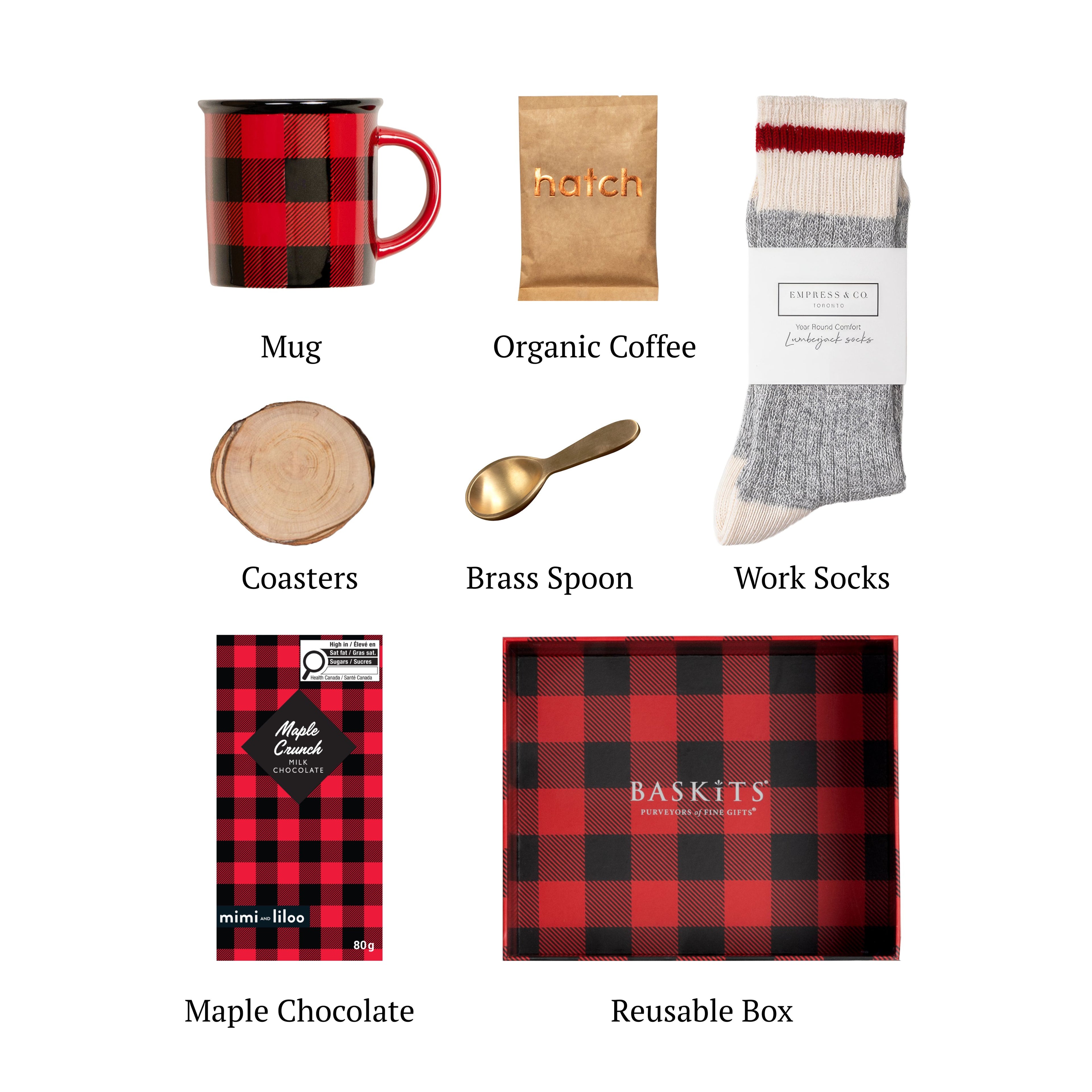 Flat lay of Lumberjack, showing all 6 items included in the box, including the Wooden Coasters,Mini Brass Spoon and base.