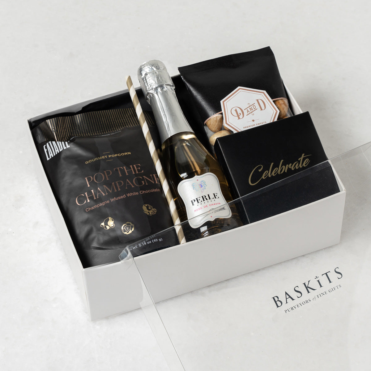 The Cheers! Non Alcoholic, a gourmet gift box featuring Assorted Chocolates, Caffe Latte Almonds and Gourmet Chocolate & Sweet Treats items. 