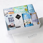 The Goodbye Gluten, a gourmet gift box featuring  Sweet Mix Gummies, Sea Salt Chocolate Bar and Chocolate & Sweet Indulgence items. 