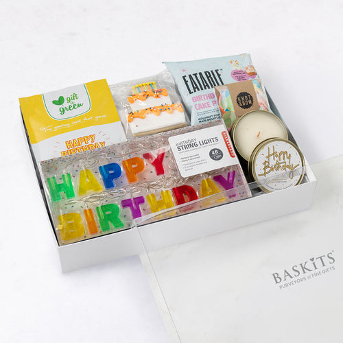 The Happy Birthday! M, a gourmet gift box featuring Birthday Cake Cookie, Birthday Cake Pops and Sweet Indulgences items. 