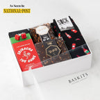 The Hot Stuff, a gourmet gift box featuring  Chocolate Fire Square, Chili Nut Mix and Gourmet Treats & Sips items. 