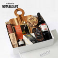 The Not Too Sweet (Red), a gourmet gift box featuring Handcrafted Salami, Brie Cheese and Gourmet Cheese & Charcuterie items. 