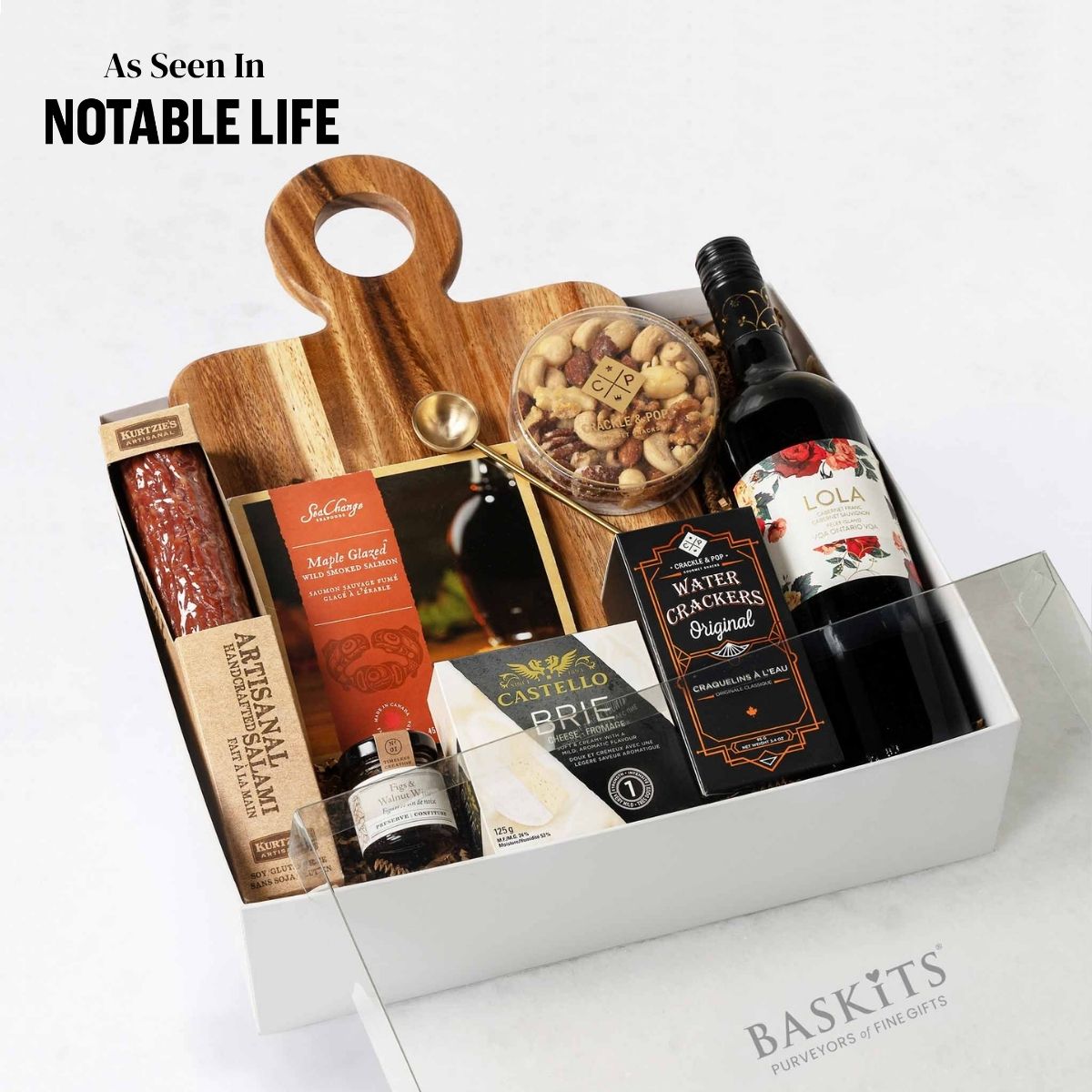 The Not Too Sweet (Red), a gourmet gift box featuring Handcrafted Salami, Brie Cheese and Gourmet Cheese & Charcuterie items. 