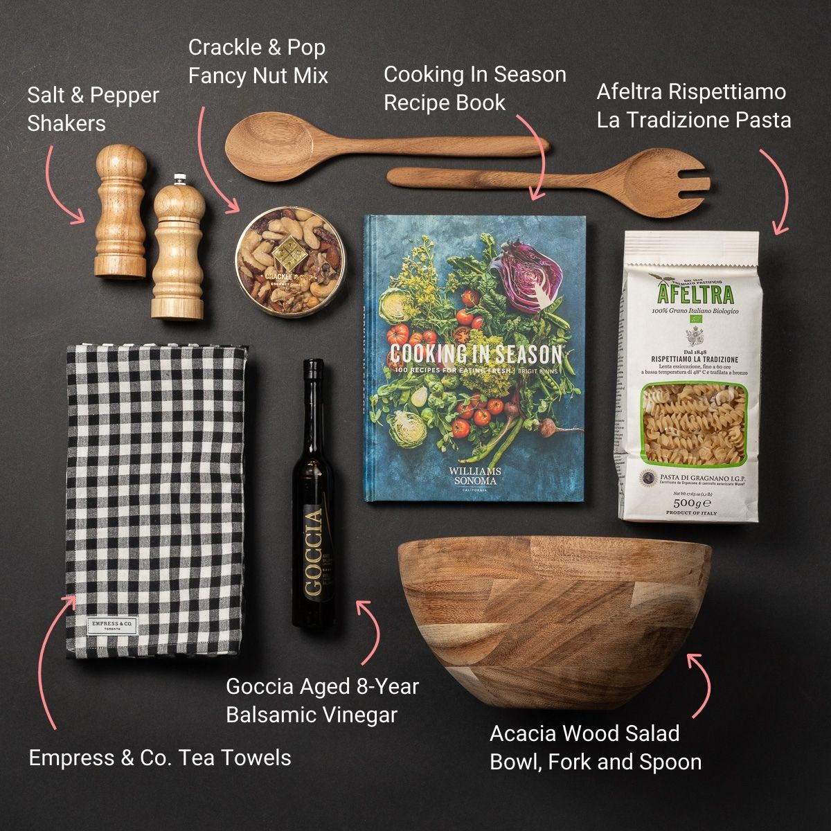 Flat lay of Salad Bowl, showing all 8 items included in the bowl, including the Crackle & Pop Fancy Nut Mix, Afeltra Organic Pasta and bowl.