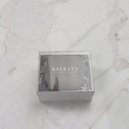 Hands unpacking a 2-piece Travel Jewelry Case, displaying a Mini Jewelry Case and Reusable White Box with a Clear Top.