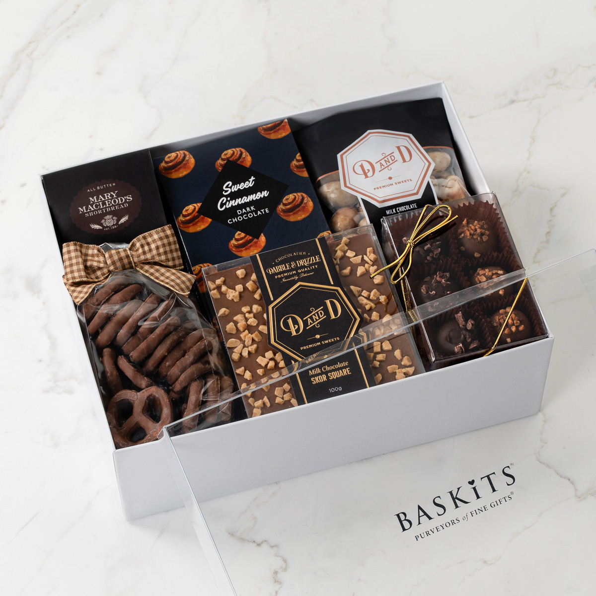 Gift box containing various chocolate treats