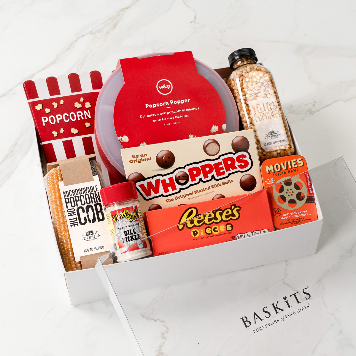 Gift box containing movie night snacks